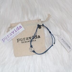 Pura Vida Bracelet, Silver Wave Charm on a blue adjustable band with bag